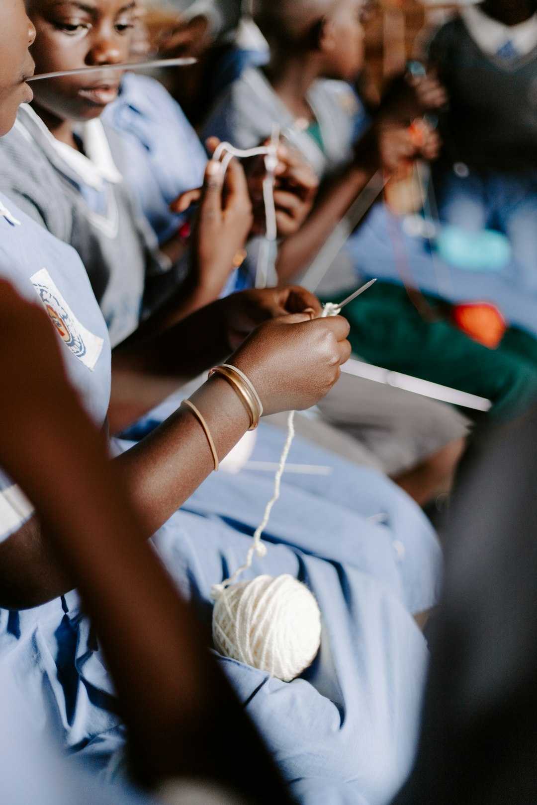 gallery-05 Mission trip: boys and girls learning how to knit in Uganda, Africa